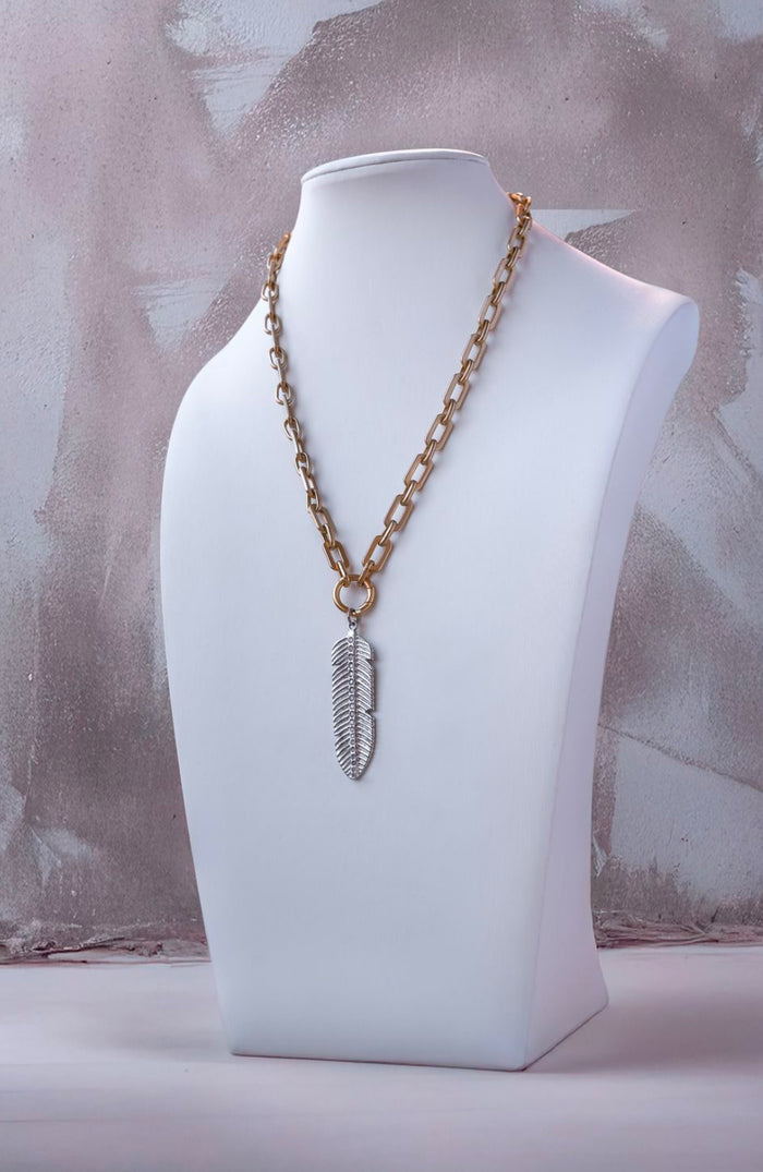 The Feather of Hope in Matte Gold with Gold Carabiner