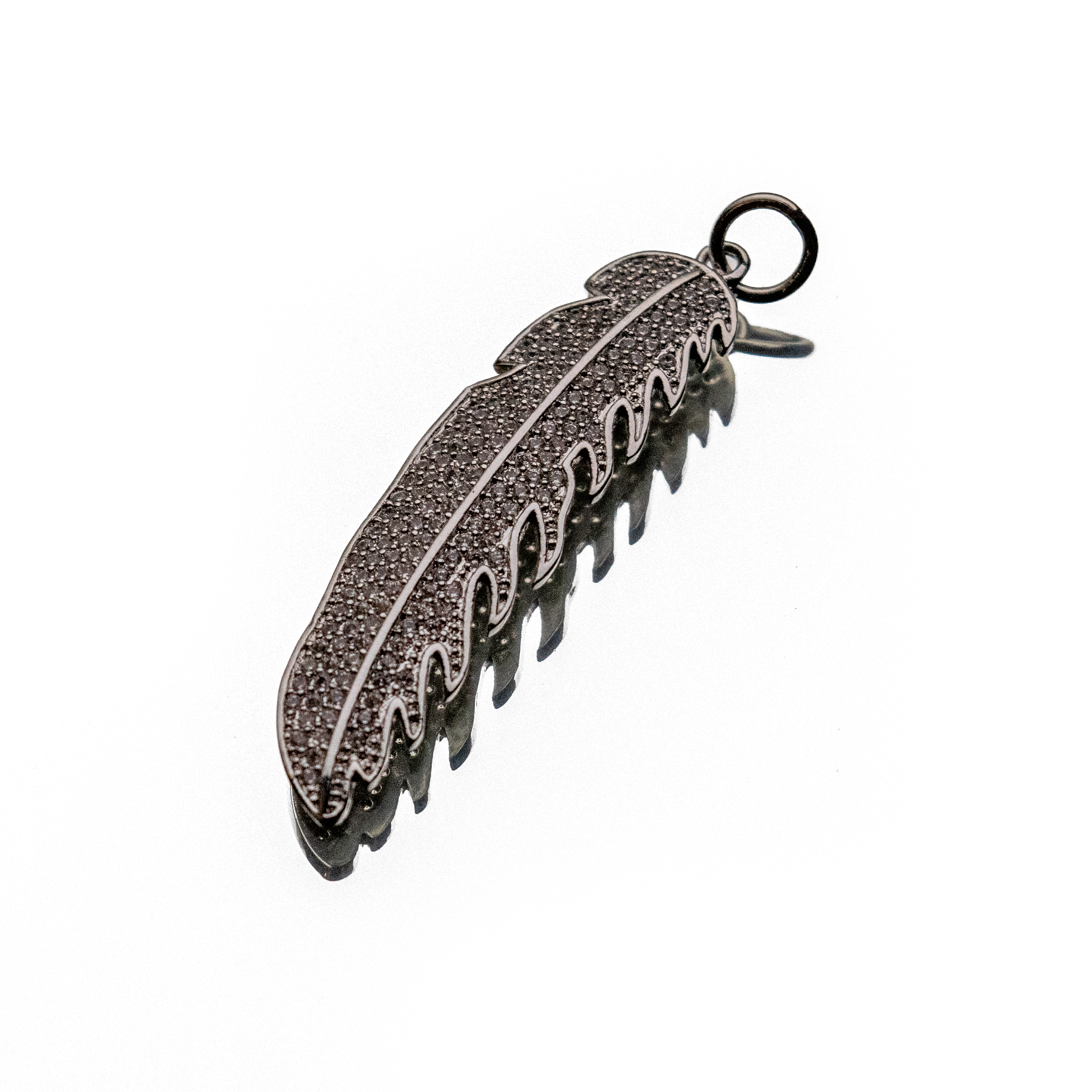 MIDNIGHT PLUME CHARM