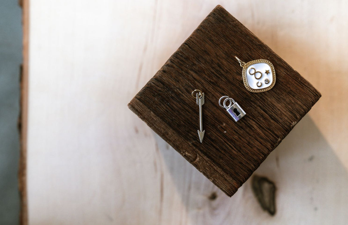 Infinity, silver arrow, or silver lock