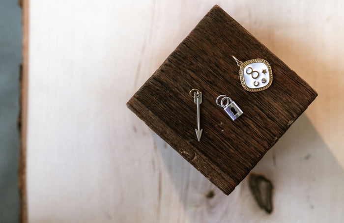 Infinity, silver arrow, or silver lock