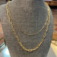 Gold bound layer necklace